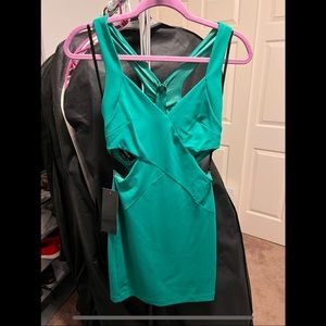 Green Bebe cocktail dress.